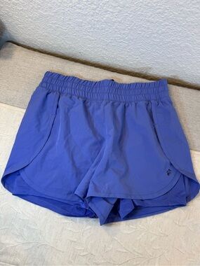 A Core Lightweight Women's Athletic Shorts in Periwinkle Blue. Women's Size L